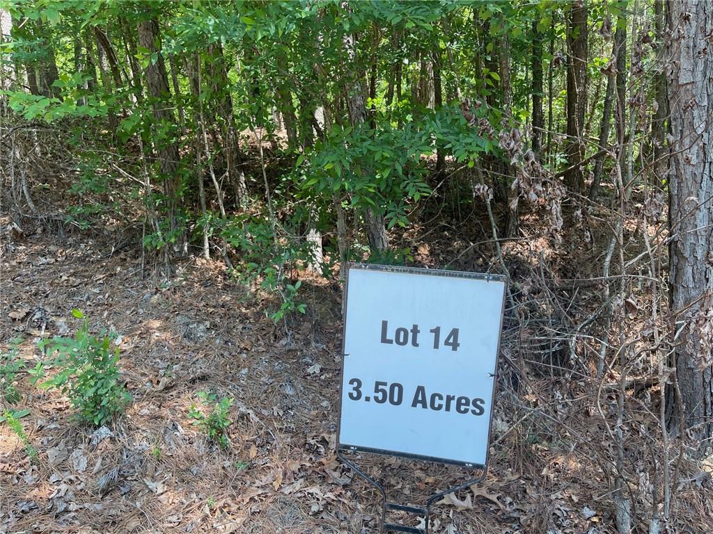 Lot 14 Chalcrest Way Cave Spring, GA 30124 - Photo 11 of 56 a sign broad in a forest