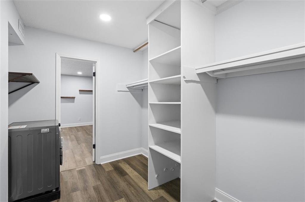 6851 Roswell Road, Unit N10 Atlanta, GA 30328 - Photo 17 of 26 a view of walk in closet with empty racks