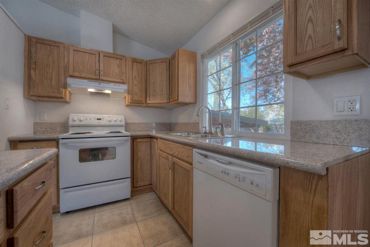 1645 Wyoming Avenue Reno, NV 89503 - Photo 13 of 28 a kitchen with cabinets appliances and a sink