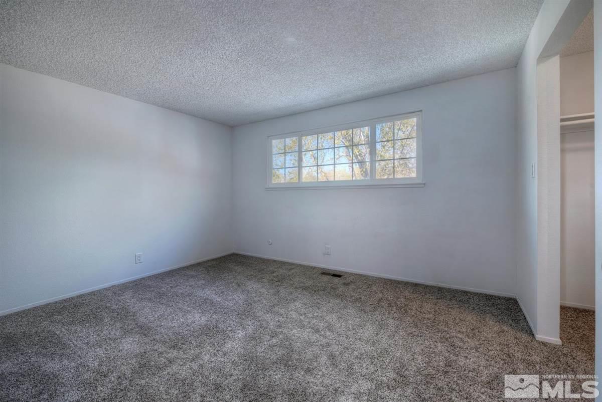 1645 Wyoming Avenue Reno, NV 89503 - Photo 16 of 28 an empty room with a empty space and window