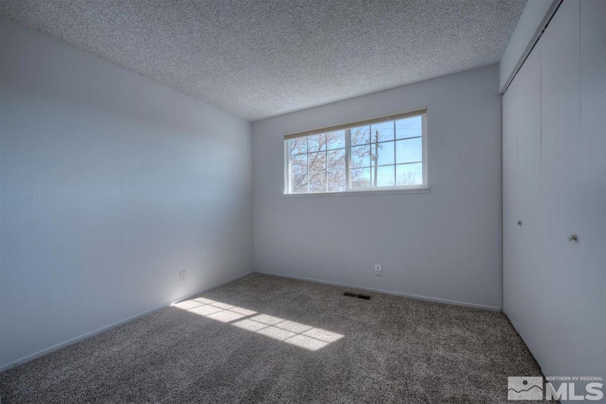 1645 Wyoming Avenue Reno, NV 89503 - Photo 21 of 28 an empty room with a window