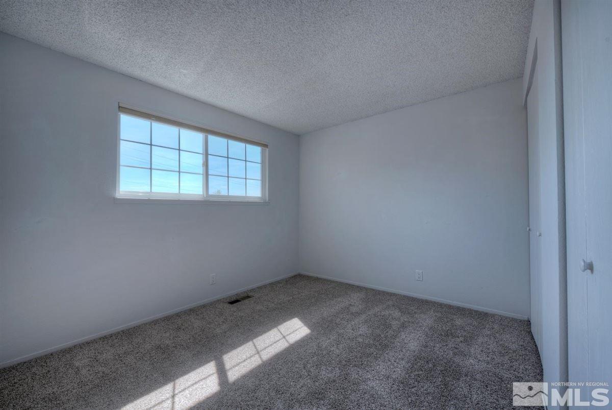 1645 Wyoming Avenue Reno, NV 89503 - Photo 22 of 28 an empty room with a window