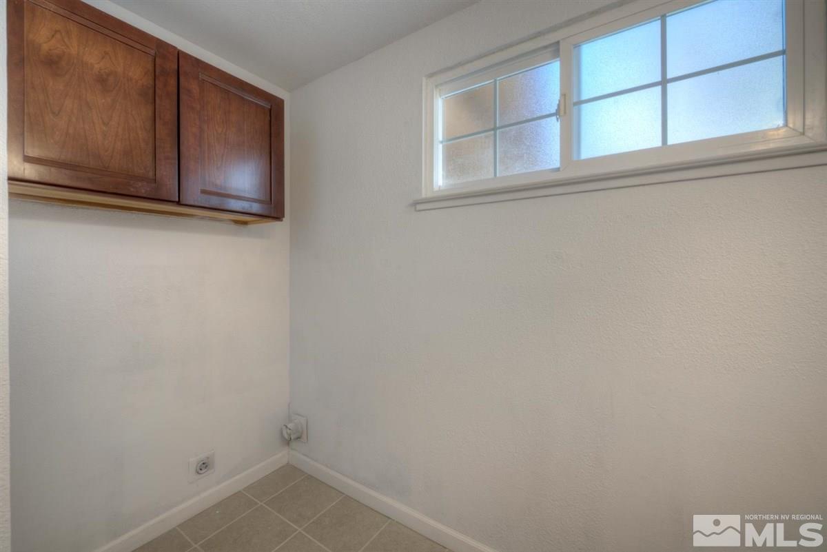 1645 Wyoming Avenue Reno, NV 89503 - Photo 25 of 28 a view of a microwave and cabinets