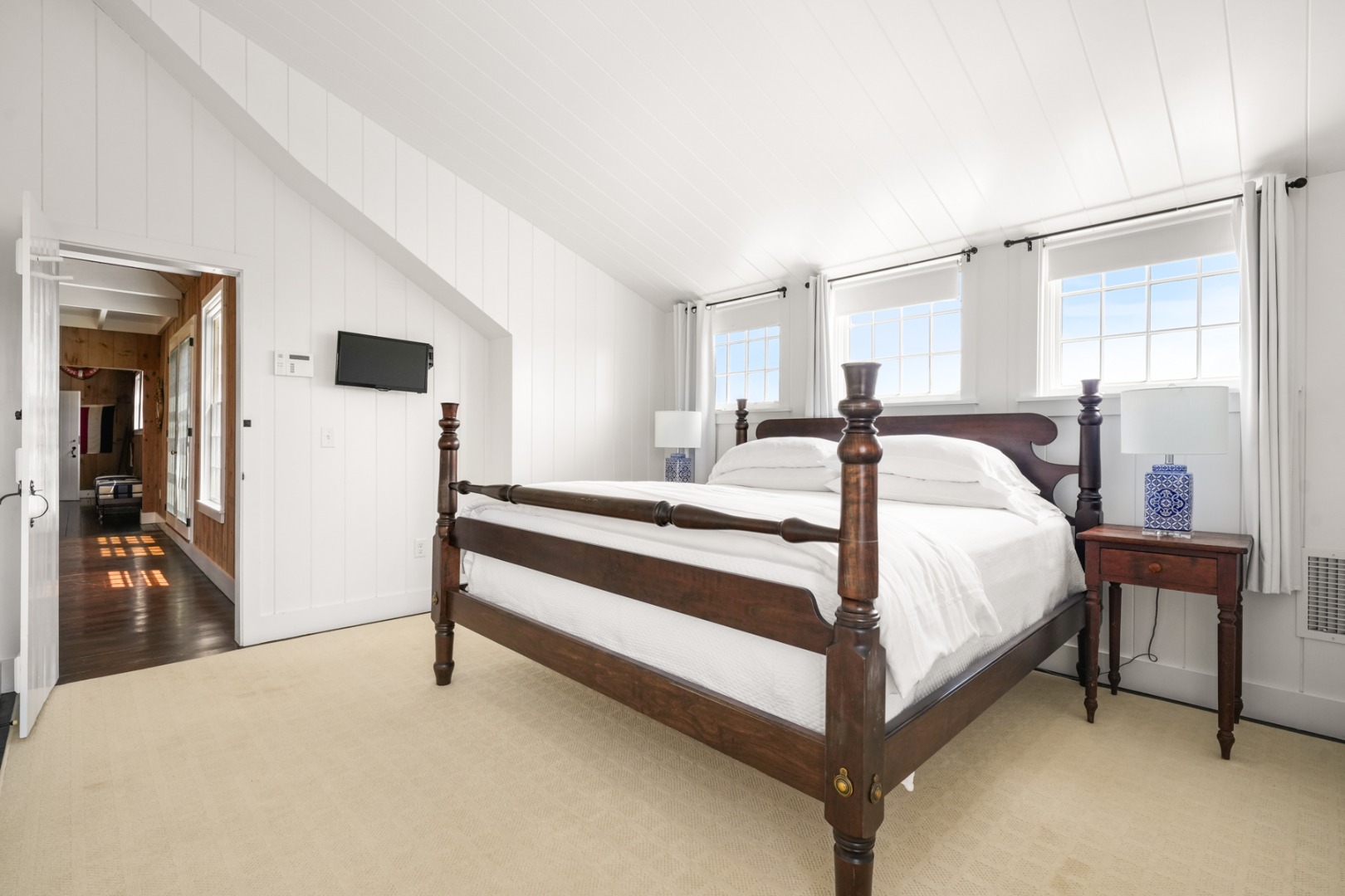21 Quidnet Road Nantucket, MA 02554 - Photo 33 of 62 a bed room with a bed and a chair