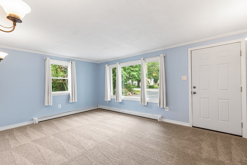 99 Swansom Road Swansea, MA 02777 - Photo 6 of 42 a view of room with window and hardwood floor