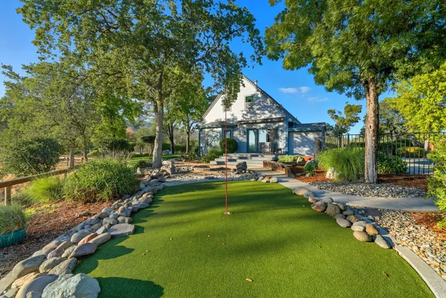 a view of swimming pool and patio