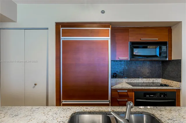 a room with a bed and a fireplace