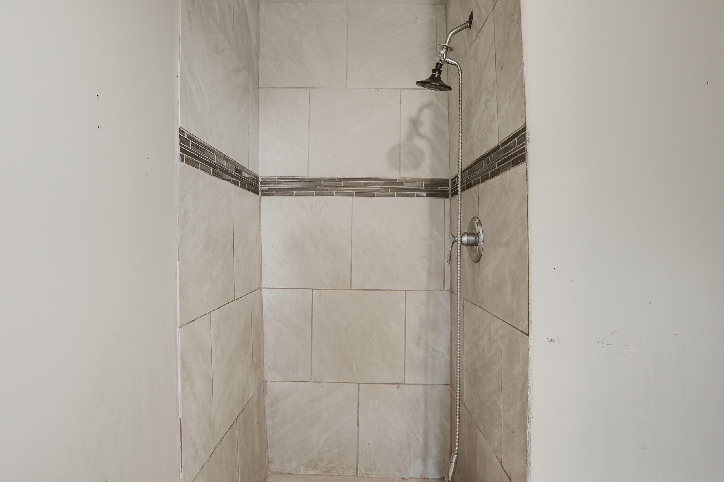 4001 Virginia Street Gary, IN 46409 - Photo 11 of 12 a bathroom with a glass shower door