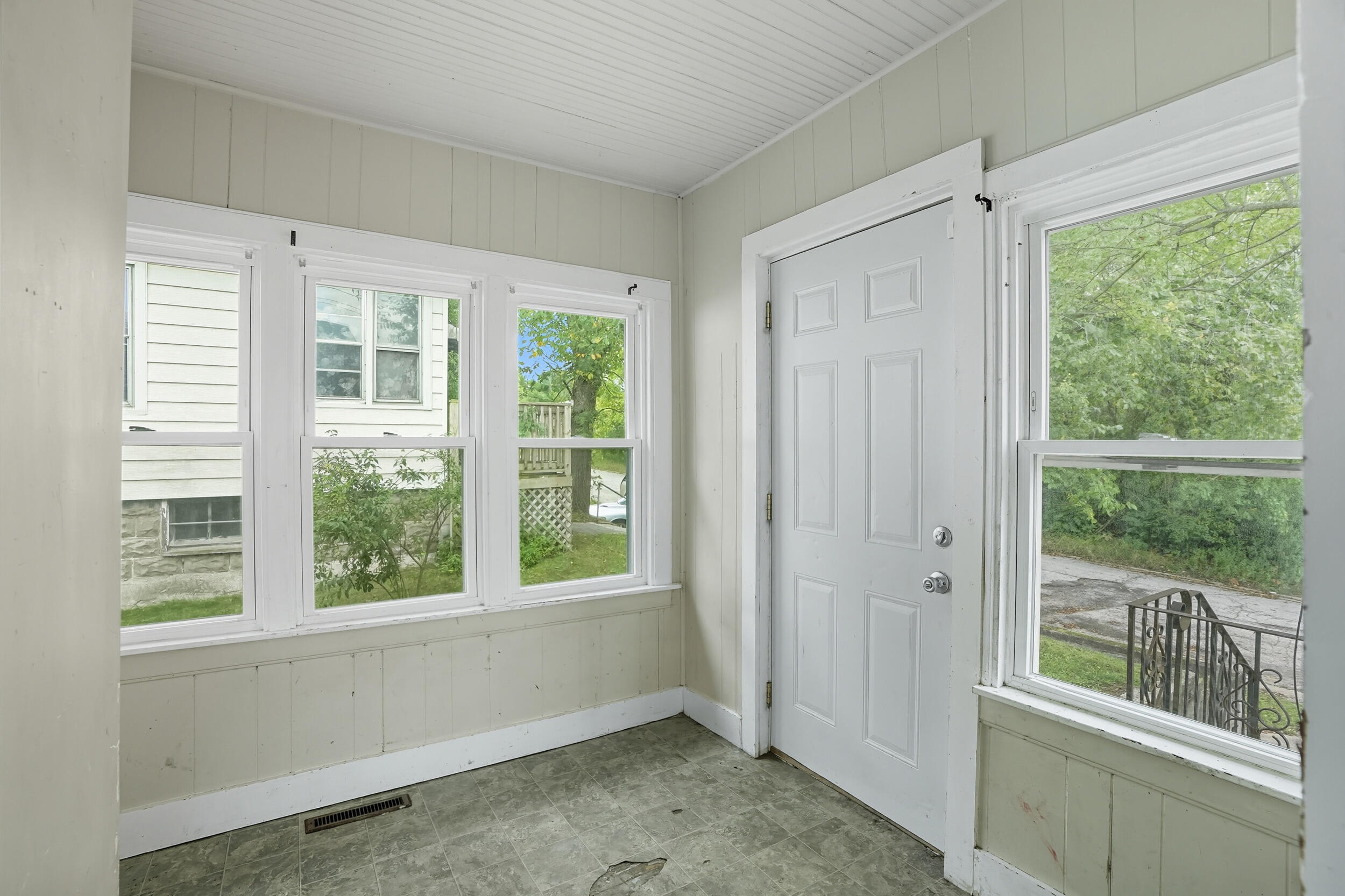 4001 Virginia Street Gary, IN 46409 - Photo 12 of 12 an empty room with wooden floor and windows