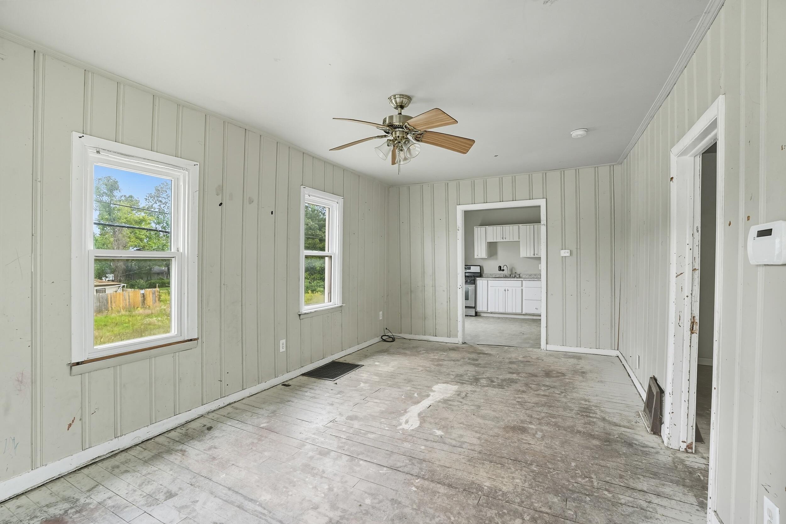 4001 Virginia Street Gary, IN 46409 - Photo 3 of 12 a view of an empty room with a window