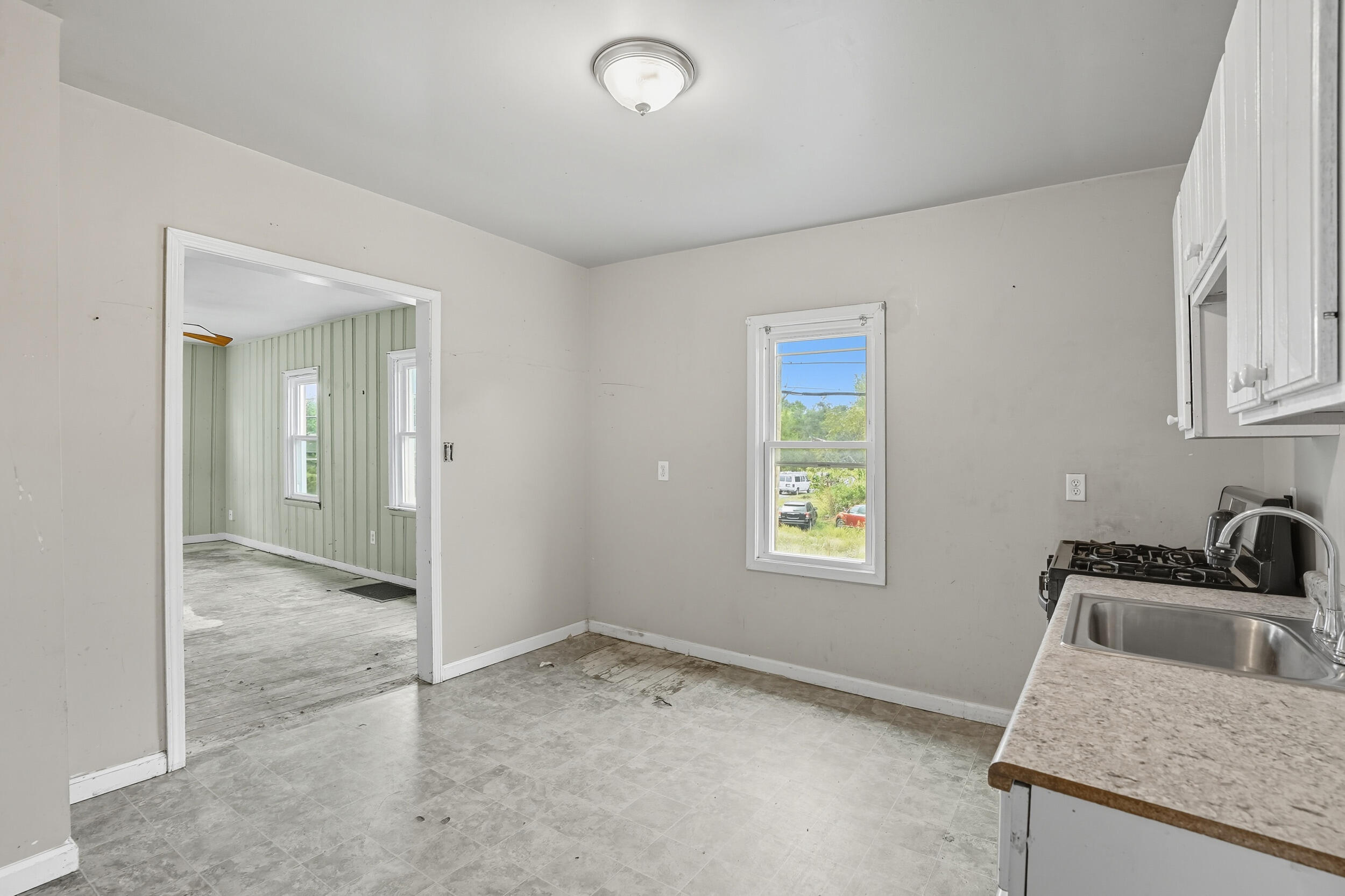 4001 Virginia Street Gary, IN 46409 - Photo 4 of 12 an empty room with windows