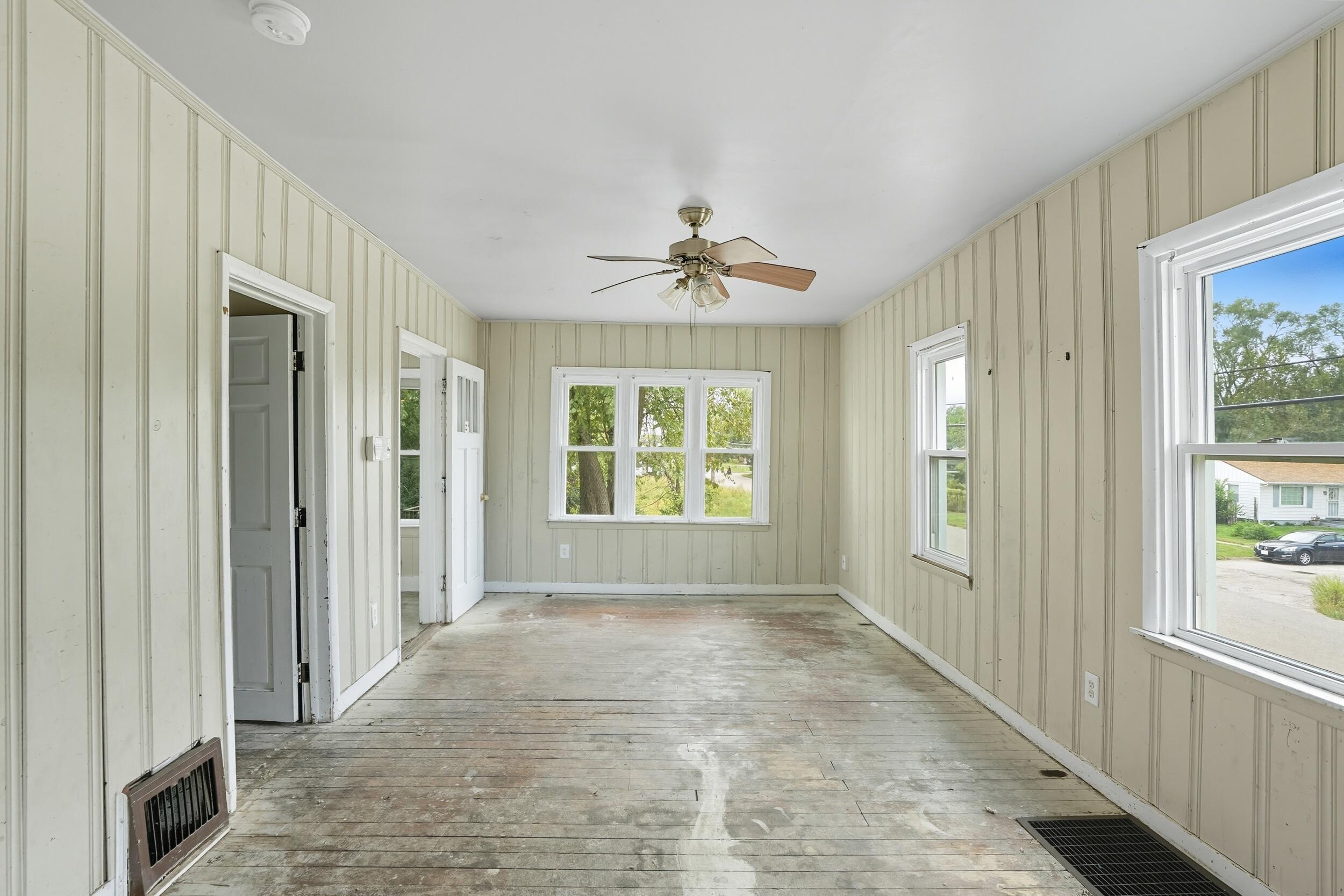 4001 Virginia Street Gary, IN 46409 - Photo 7 of 12 a view of an empty room with a window