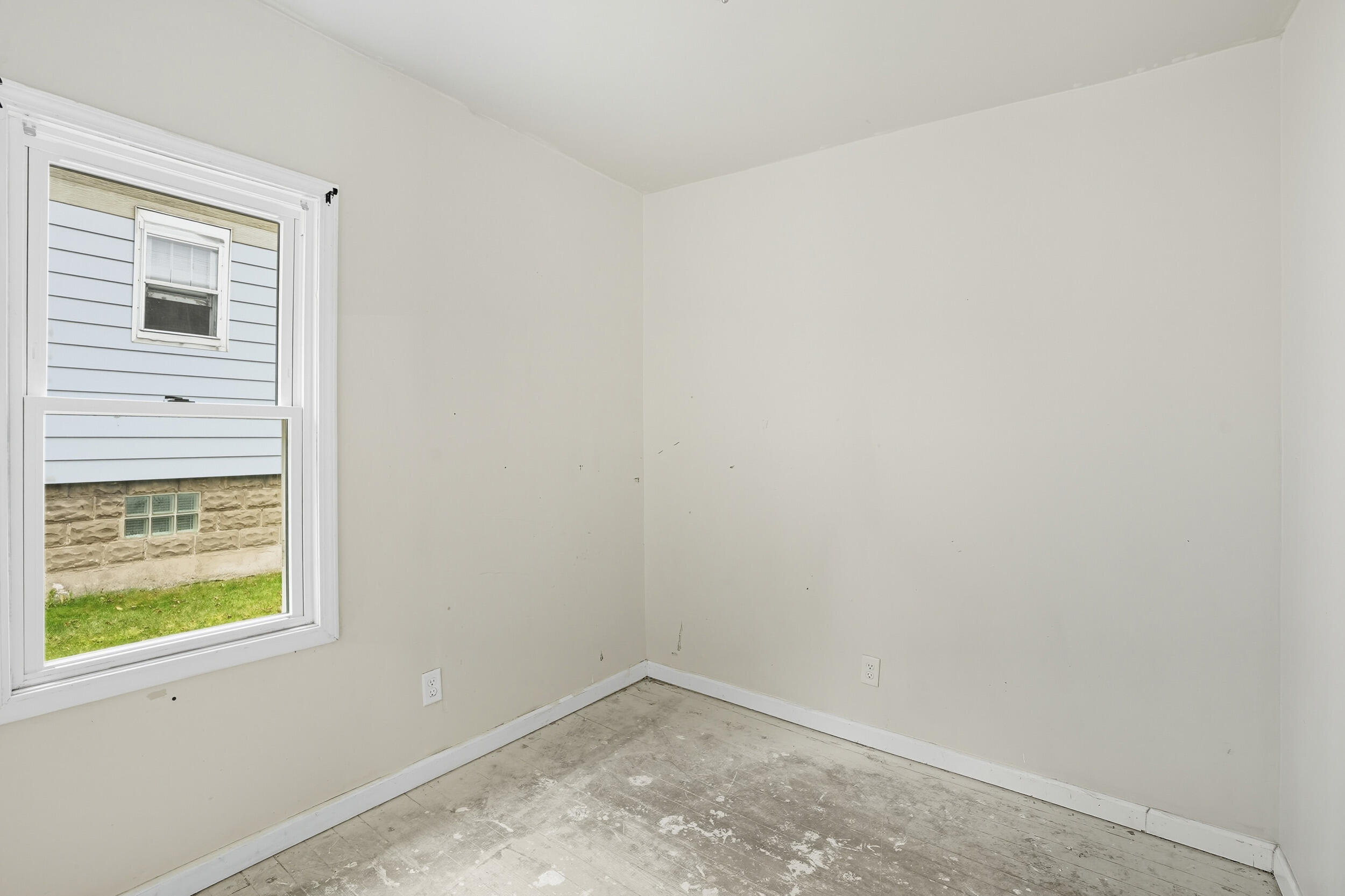 4001 Virginia Street Gary, IN 46409 - Photo 9 of 12 a view of an empty room with a window
