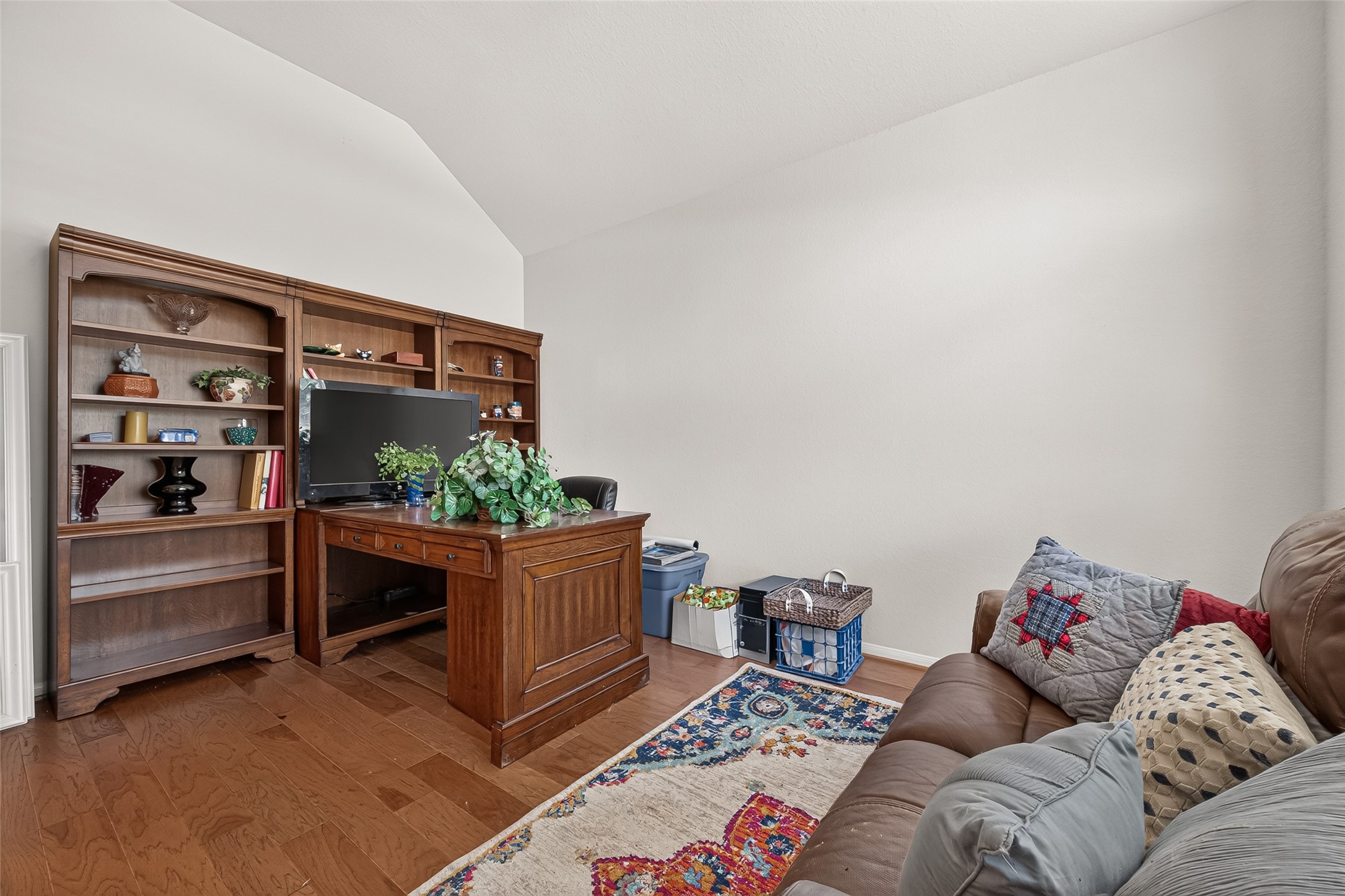 4910 Culver Lane Rosenberg, TX 77471 - Photo 14 of 50 This home office/study has a huge window for pure light and lovely engineered wood floors. Perfectly situated at the front of the home.