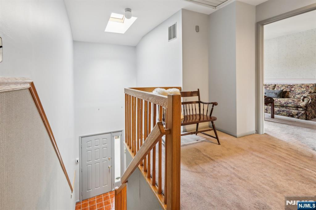 70 River Road, Unit C003 Clifton, NJ 07014 - Photo 19 of 35 a view of a hallway with interior of the house
