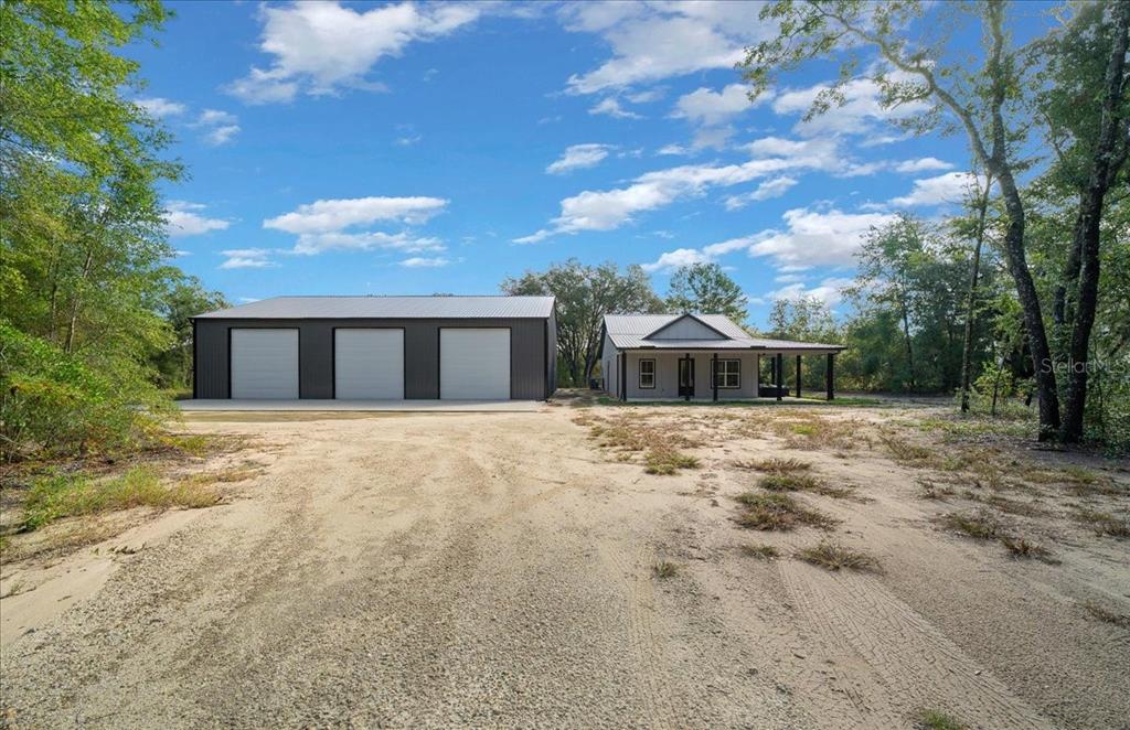 252 Malauka Road Ocklawaha, FL 32179 - Photo 55 of 78 a front view of house with yard