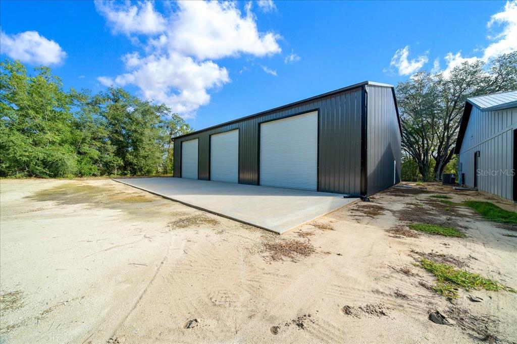 252 Malauka Road Ocklawaha, FL 32179 - Photo 56 of 78 a view of a backyard of the house