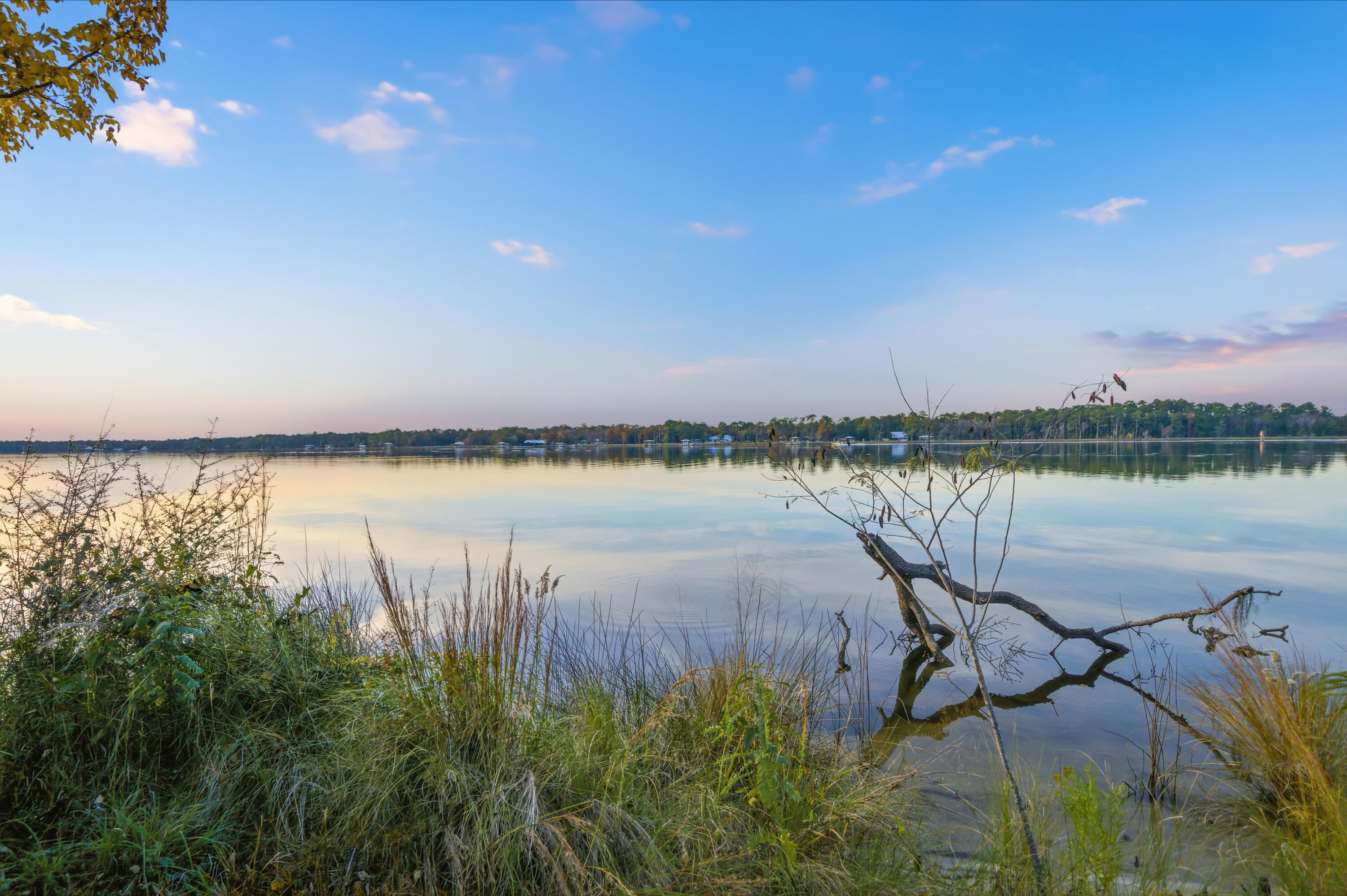 Lot 9 Holly Point Road Freeport, FL 32439 - Photo 11 of 14 a view of a lake with houses in the back