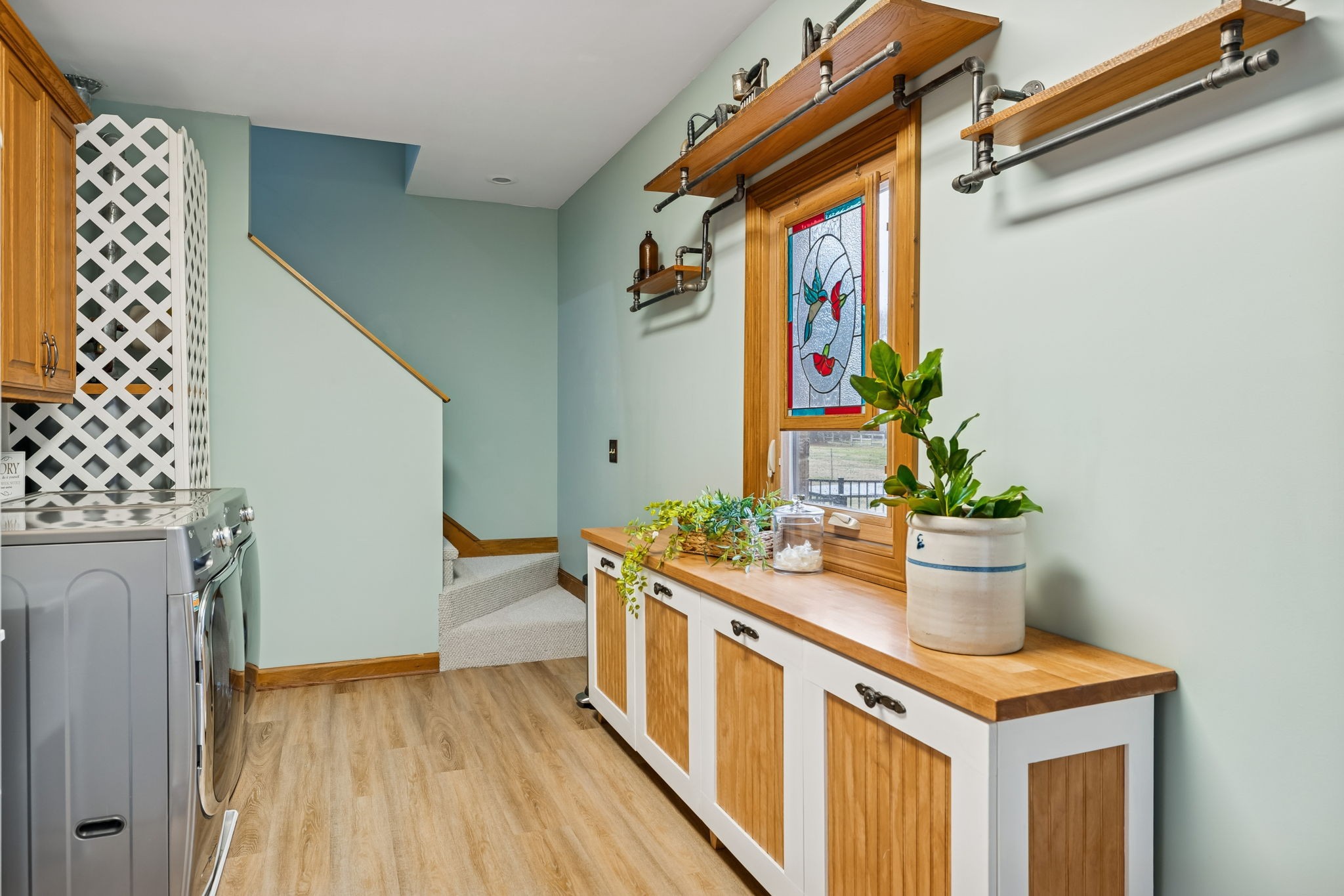 2537 York Road Nolensville, TN 37135 - Photo 43 of 84 a hallway with a potted plant on the wall
