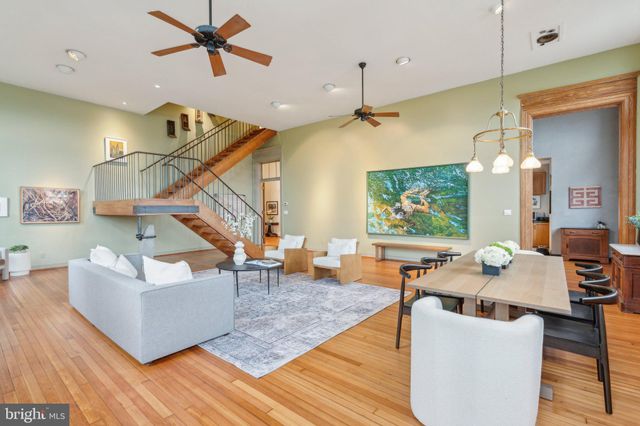 a view of entrance of the house with a garden