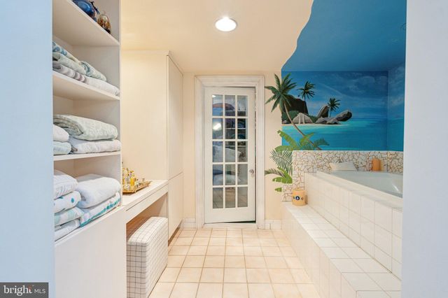 a bed room with a bed and a window