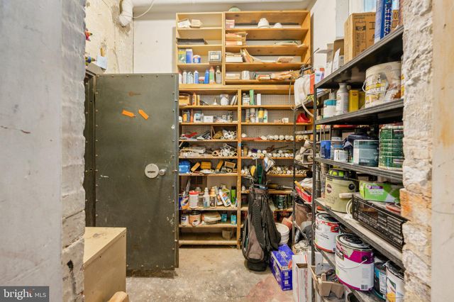 a picture of a bench in a white building