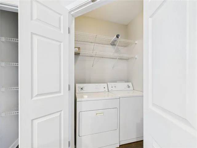 a utility room with dryer and washer