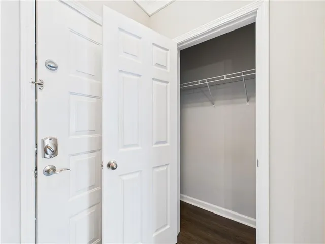 a bathroom with a glass shower door