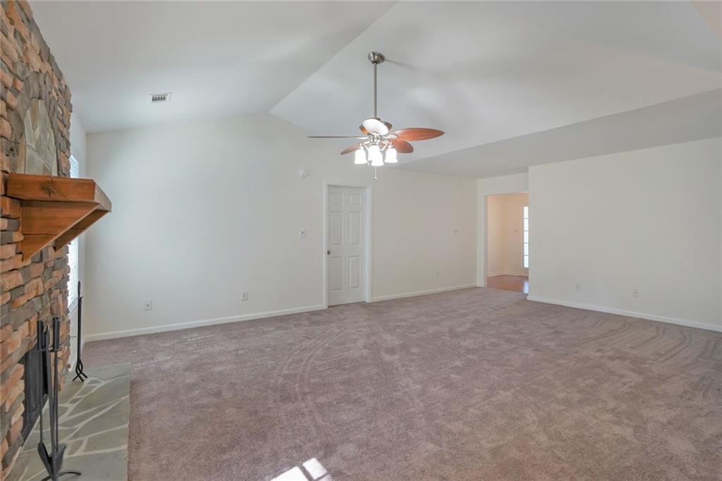 211 West Bridge Drive Dallas, GA 30157 - Photo 13 of 26 a view of an empty room with a chandelier fan
