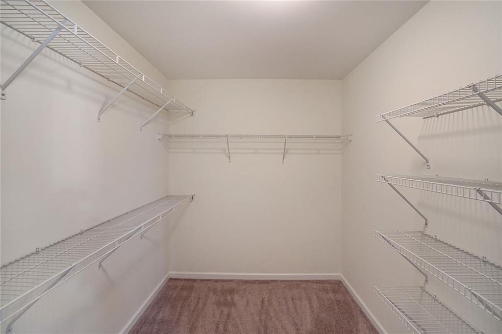 211 West Bridge Drive Dallas, GA 30157 - Photo 19 of 26 a view of a room with racks on the wall
