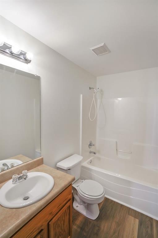 211 West Bridge Drive Dallas, GA 30157 - Photo 22 of 26 a bathroom with a sink a toilet and shower