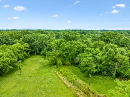 a view of a golf course with a big yard