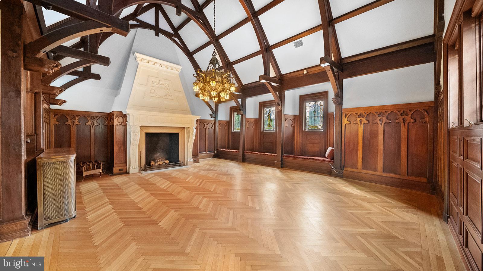 1717 Woodland Road Abington, PA 19001 - Photo 24 of 141 a view of an empty room with a fireplace and a window