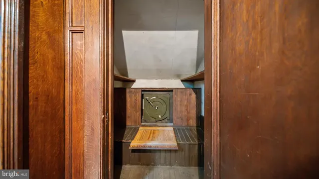 a bathroom with a tub shower vanity and a sink