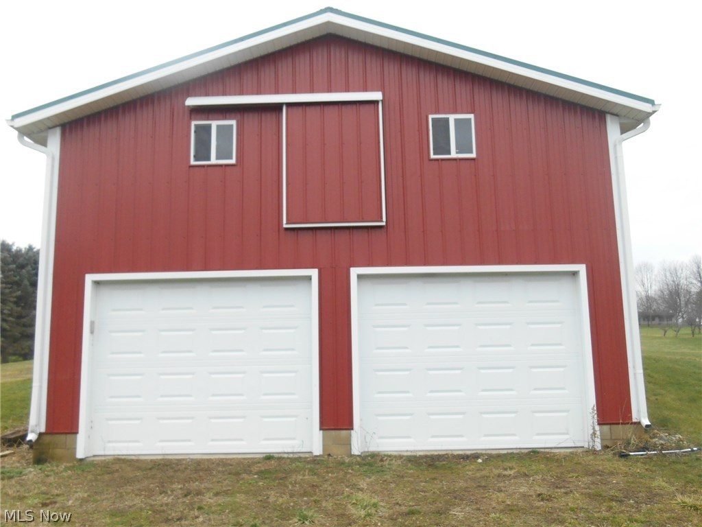 800 Bell Road Wooster, OH 44691 - Photo 5 of 33 Lower level of garage with door openers.