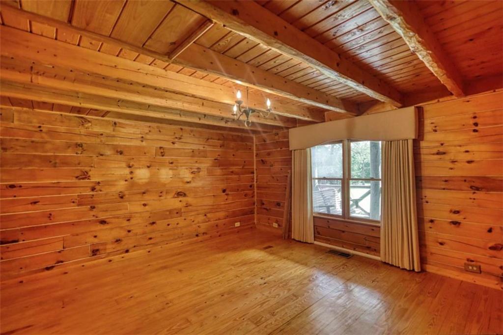 2665 Macedonia Road Franklin, GA 30217 - Photo 32 of 68 a view of empty room with wooden floor and fan