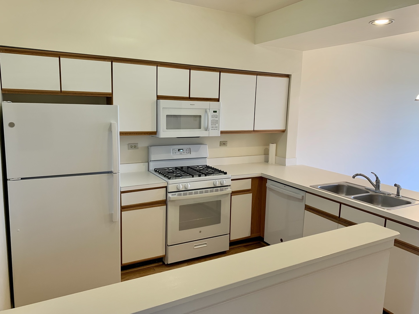 17870 Braewick Road Gurnee, IL 60031 - Photo 24 of 28 a kitchen with stainless steel appliances a refrigerator sink and microwave
