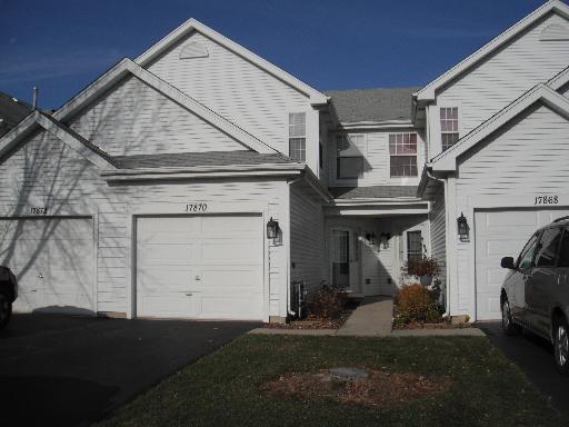 17870 Braewick Road Gurnee, IL 60031 - Photo 28 of 28 a front view of a house with a yard