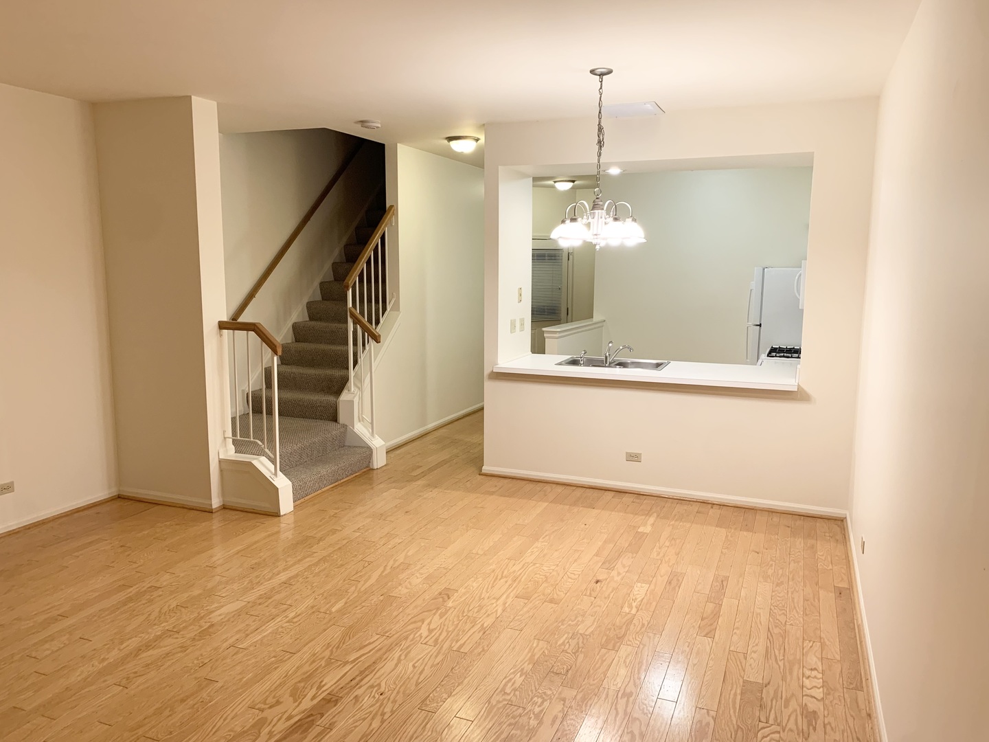 17870 Braewick Road Gurnee, IL 60031 - Photo 4 of 28 a view of a room with wooden floor and white walls