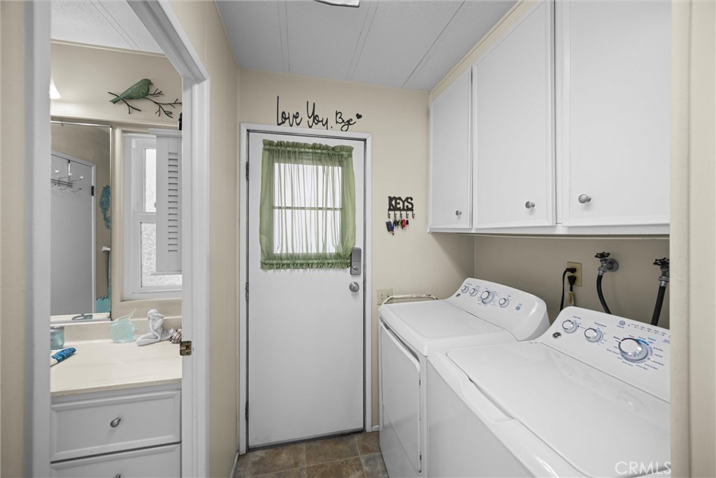9800 Base Line Road, Unit 71 Rancho Cucamonga, CA 91701 - Photo 13 of 42 a utility room with dryer and washer