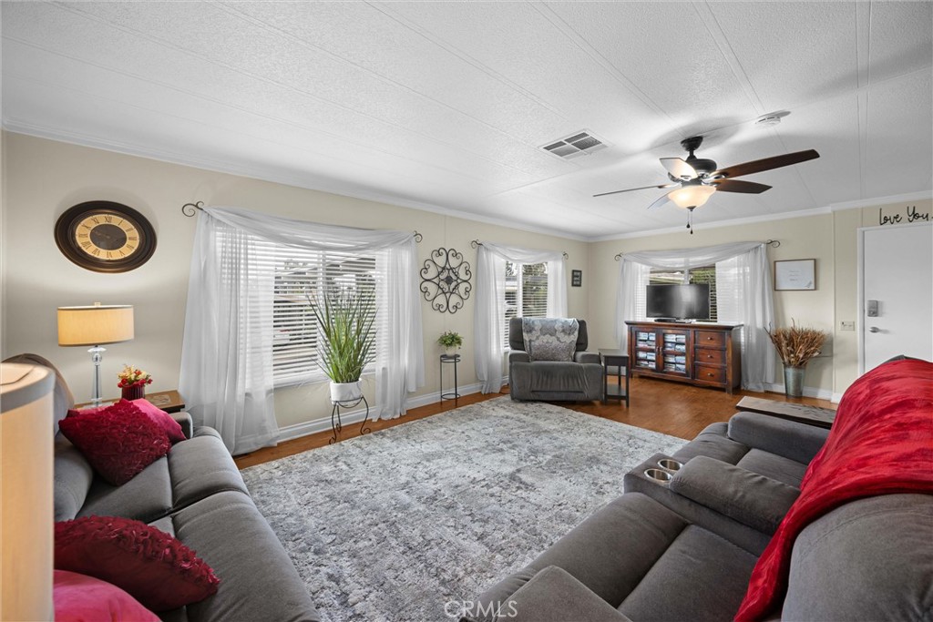9800 Base Line Road, Unit 71 Rancho Cucamonga, CA 91701 - Photo 2 of 42 a living room with furniture and a window