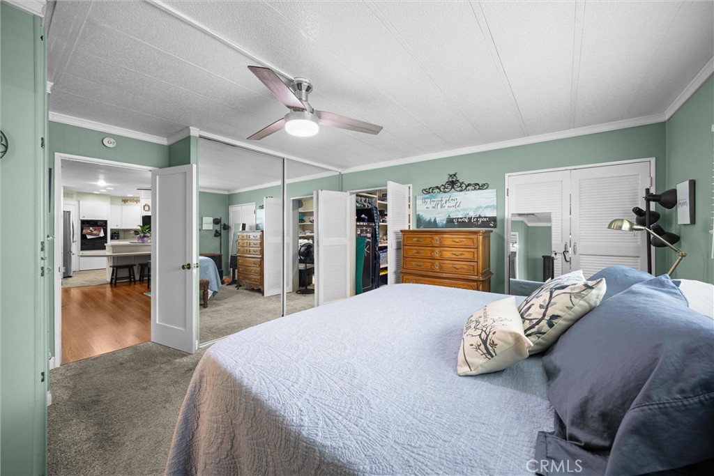 9800 Base Line Road, Unit 71 Rancho Cucamonga, CA 91701 - Photo 27 of 42 a bedroom with bed and walk in closet