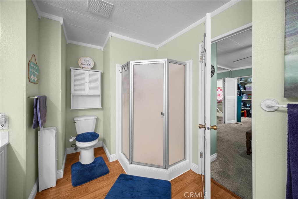 9800 Base Line Road, Unit 71 Rancho Cucamonga, CA 91701 - Photo 30 of 42 a bathroom with a toilet and a shower