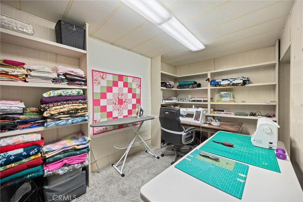 9800 Base Line Road, Unit 71 Rancho Cucamonga, CA 91701 - Photo 31 of 42 a room with furniture and a wooden floor