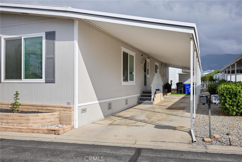 9800 Base Line Road, Unit 71 Rancho Cucamonga, CA 91701 - Photo 32 of 42 a view of a house with a patio