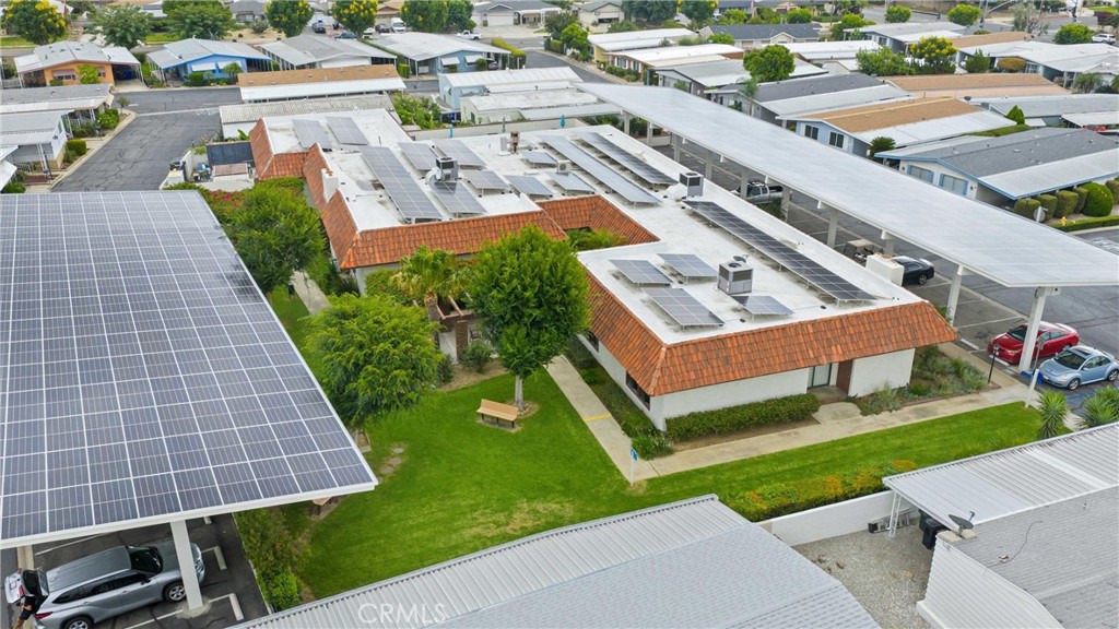 9800 Base Line Road, Unit 71 Rancho Cucamonga, CA 91701 - Photo 40 of 42 a aerial view of a yard with table and chairs