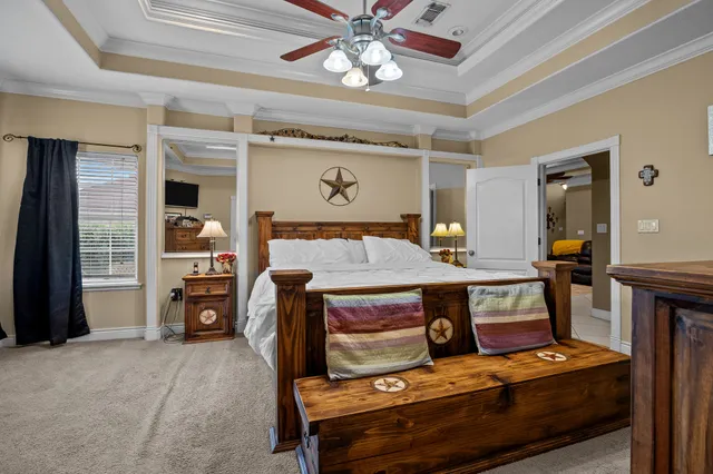 a room with furniture and a chandelier