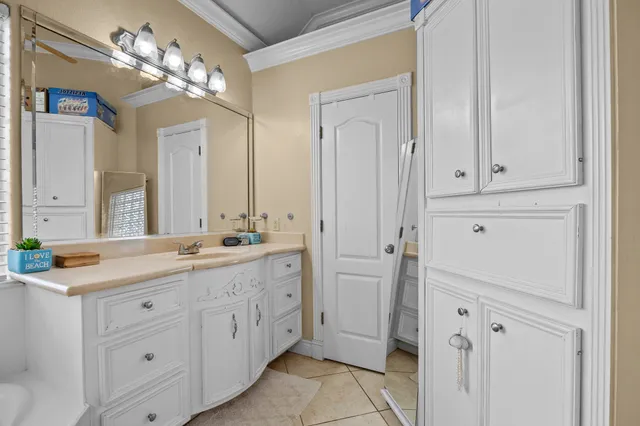 a spacious bathroom with a granite countertop sink a large mirror a shower and a bathtub
