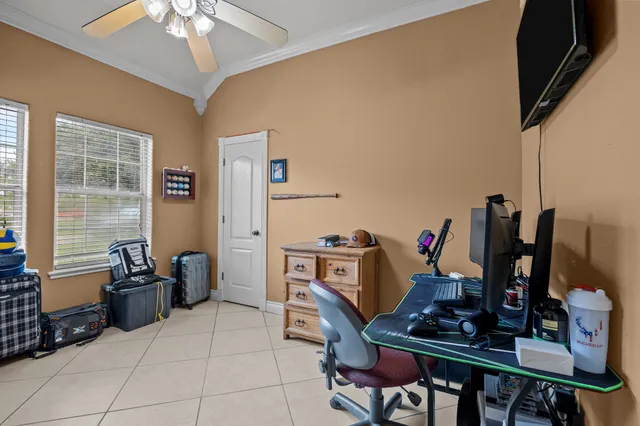 a view of a workspace with furniture