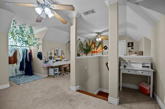 a view of a dining room with workspace and a window